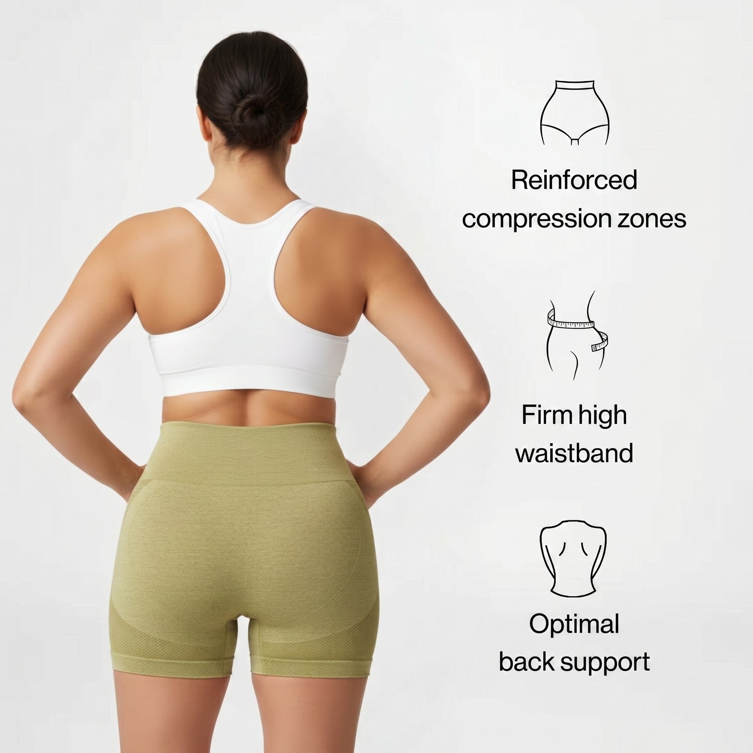 Woman wearing green compression shorts with text on a white background