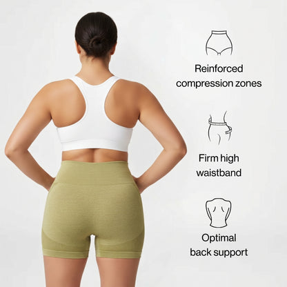 Woman wearing green compression shorts with text on a white background